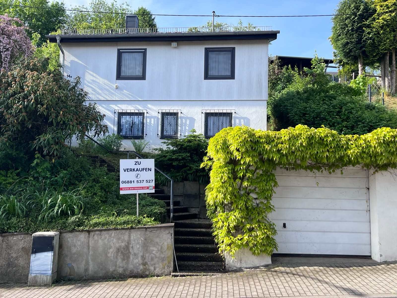 SPIESEN - ELVERSBERG : Kleiner BUNGALOW mit VOLLKELLER und separater GARAGE !